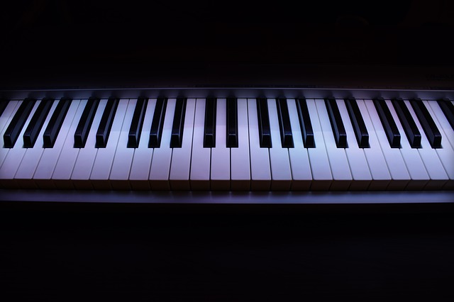 a digital piano in a dimly lit area